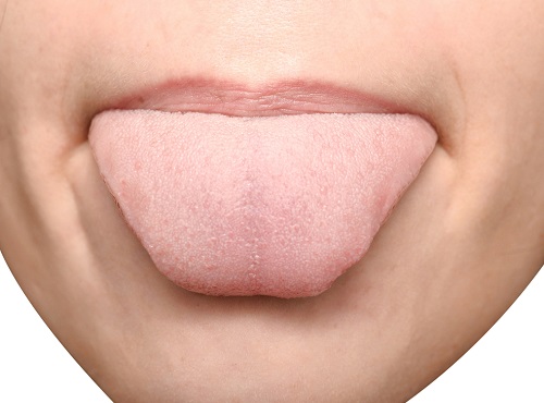 Was weißer Belag auf der Zunge über Seele und Gesundheit verrät