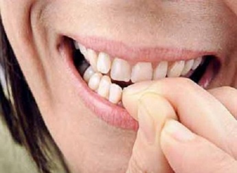 Was sagt Nägelkauen über die Persönlichkeit aus?