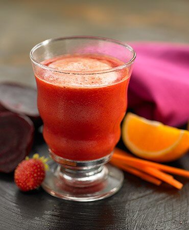 Erdbeeren und Orangen für Smoothies