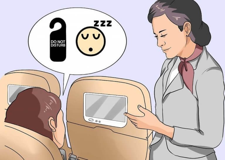 9 Tricks, wie du im Flugzeug schlafen kannst