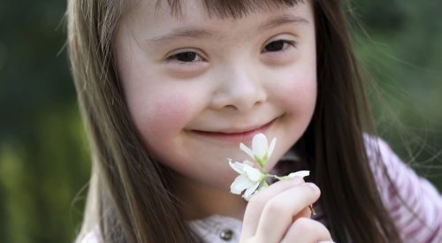 Mädchen mit Down-Syndrom
