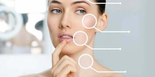 Verschiedene Punkte deuten auf unterschiedliche Punkte im Gesicht und Nacken einer Frau.