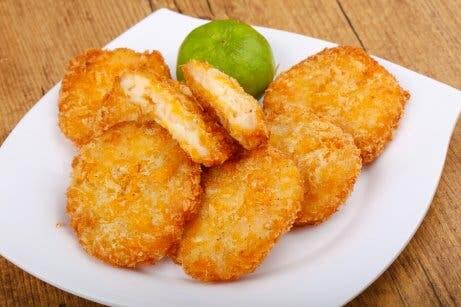 Rezept für Krabbenkuchen: in Öl herausgebacken und mit Zitrone