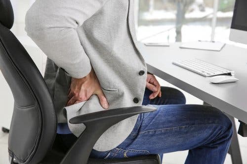 Beschwerden durch Krampfadern - langes Sitzen vermeiden